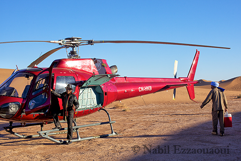 Nabil from Nabil Voyage with helicopter